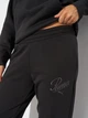 Спортивные штаны на флисе женские Puma Essentials Graphics 68807401 XL Black (4069157462785) - изображение 4