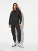 Спортивный костюм на флисе женский Puma 68934601 XS Black (4069157424516) - изображение 1