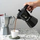 Кофеварка гейзерная для плиты алюминиевая 6 чашек Bialetti черная - изображение 8