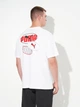 Футболка хлопковая длинная мужская Puma Essentials Graphics 68817902 M White с принтом (4069157679435) - изображение 1