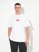 Футболка хлопковая длинная мужская Puma Essentials Graphics 68817902 M White с принтом (4069157679435) - изображение 2