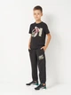 Подростковая футболка для мальчика Puma MID90s Graphic 68846401 146-152 см Puma Black (4069157398947) - изображение 3