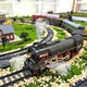 Железная дорога 602 B, 5 вагонов, длина 93 см, путь 99х138 см, подсветка, парогенератор, звук/беззвучный режим, движение вперед-назад, аккумулятор 3.7V. - изображение 3