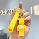 Брелок KAWS Companion Yellow Солнечный Мишка Энергия Арт-сувенир для Коллекционеров Кавс Желтый - изображение 1