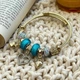 Браслет Twisted Rope с подвесками в форме сердец и шармами - Blue&Gold - изображение 3