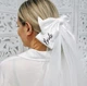 Фата для нареченої на затискачі для дівич-вечора біла з бантом "Bride" - изображение 2