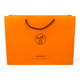 Пакет Hermes 42х14х30 см из плотной бумаги, оранжевый фирменный пакет с черными веревочными ручками - изображение 1