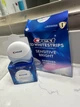 Отбеливающие полоски для чувствительных зубов Crest 3D Whitestrips Sensitive + LED Light Whitening Kit 14 пар - изображение 15