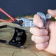 Рогатка DEXT Cobra Laser Black Набор для Охоты Maximum с лазерным прицелом, стальными шариками, жгутами, тактической сумкой и металлическим спусковым механизмом - изображение 4
