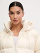 Пуховик зимний женский Puma Outerwear Classics 68838987 L Alpine Snow (4069157422406) - изображение 7