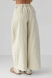 Котонові штани-палаццо зі складками - бежевий цвет, M - изображение 2