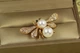 Брошь Xuping Jewelry Жучок с двумя жемчужинами золотистая - изображение 1