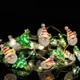 Гирлянда на батарейках с таймером Kaktus Санта и елка 20LED 2м теплый белый - изображение 4