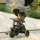 Трехколесный детский складной велосипед Tri-Cycle RITO DELUXE 5-в-1 оливковый прогулочный трансформер от 12 месяцев с родительской ручкой защитным козырьком и надувными колесами 10″ - изображение 8