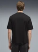 Футболка хлопковая длинная мужская Puma Graphics 69178501 2XL Black с принтом (4069161649271) - изображение 2