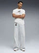 Футболка хлопковая длинная мужская Puma Essentials Graphics 69203102 S White с принтом (4069161672446) - изображение 3