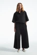 Кюлоти жіночі COS elasticated pleated culottes 1221419001 34 Чорний - зображення 2