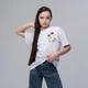 Футболка оверсайз для дівчинки Melanika "Квітуче поле" біла D-47-128-134 - изображение 1