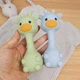 Силиконовый грызунок-погремушка Cheeks «Жираф» 2 в 1 оливковый — первый мягкий друг вашего малыша - изображение 4