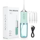 Портативний іригатор Oral Irrigator S3J2 зелений для зубів USB акумулятор IPX7 3 насадки 3 режими 200 мл - зображення 1