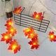 Светодиодная гирлянда кленовые листья 2 метра 10 LED-ламп питание на батарейках, Оранжево-красный - изображение 3