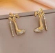 Женские сережки бижутерия "Туфельки" jewelry Золотистые - изображение 6