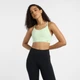 Женский зеленый топ New Balance Essential Train Bra 34 (XS) (WB51039MEW) - изображение 1