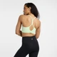 Женский зеленый топ New Balance Essential Train Bra 34 (XS) (WB51039MEW) - изображение 2