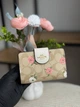 Гаманець Coach Snap Wallet In Signature Canvas бежевий рожевий rвіточки сердечка білий натуральна шкіра + подарункове пакування - изображение 1