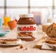 Класична Шоколадна горіхова паста Нутелла 1Кг Nutella Ferrero з лісовими горіхами Фундук та какао Скляна банка Бельгія Bruxelles EU 1000г - зображення 5