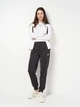 Спортивный костюм женский Puma Poly Baseball Suit Cl 69190502 S White (4069161386909) - изображение 1
