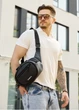 Сумка через плече бананка Sambag Flex чорна 30 × 17 × 10 см (85351001m) - зображення 1