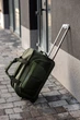 Сумка дорожня на колесах Wings Unlimeted 1106, мала (S) 55x31x30 см, 48 л оливкова - зображення 1