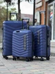 Дорожня поліпропіленова валіза Wings PHX02 Phoenix велика (L) на 4 колесах 75,5x50x30 см синя - зображення 4