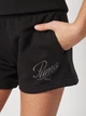 Подростковые шорты на резинке для девочки Puma Essentials Graphics 68586901 170-176 см Black (4067983504532) - изображение 4