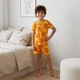 Хлопковая пижама на мальчика футболка и шорты 116-122 см (6-7Y) George оранжевый - изображение 1