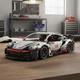 Конструктор Porsche Порше 911 GT3 RS з двигуном і пультом дистанційного керування 1580 дит Різнокольоровий (28577) - зображення 5