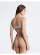 Набір жіночих трусиків Calvin Klein розмір L різнокольорові 7 шт. - зображення 1