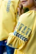 Вишита сукня для дівчинки Trend Вільна 104 Жовтий (SOLSUDVILPT) - изображение 7