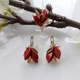 Серебряные серьги 925 пробы с кораллом и золотыми пластинами 375 пробы - изображение 6