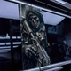 Наклейки на стойки дверей авто ARB 3D TUNING STUDIO Череп воин автомат 500х220х0.15мм=2штуки - изображение 1