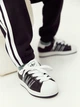 Подростковые спортивные штаны-джогеры для мальчика Adidas Essentials JJ3540 158-164 см Black (4067901460438) - изображение 6