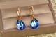 Серьги подвески Xuping Jewelry Большая капля с синим камнем Сваровски 3,4 см золотистые - изображение 2