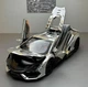 Коллекционная металлическая модель автомобиля Lamborghini Revuelto инерционная со светом, звуком и паром, хром 1:24 - изображение 2