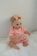 Лялька Реборн Reborn Doll 50 см, реалістична вініл-силіконова дівчинка пупс в рожевому одязі+аксесуари - зображення 3