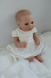 Кукла Реборн Reborn Doll 50 см, реалистичная винил-силионовая девочка пупс в одежде+аксессуары - изображение 4