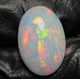 Эфиопский опал кабошон 6.2 Cts 19 х 13 мм (82522) - изображение 4