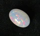 Ефіопський опал кабашон 12.5 Cts 20 х 14 мм (82530) - зображення 7