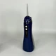 Ирригатор для полости рта 200 мл беспроводной аккумуляторный Oral Irrigator, портативный с 3 режимами работы и 4 сменными насадками для ухода за зубами, деснами и брекетами Синий, RGL-137-Blue - изображение 3