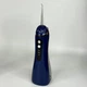 Ирригатор для полости рта 200 мл беспроводной аккумуляторный Oral Irrigator, портативный с 3 режимами работы и 4 сменными насадками для ухода за зубами, деснами и брекетами Синий, RGL-137-Blue - изображение 7